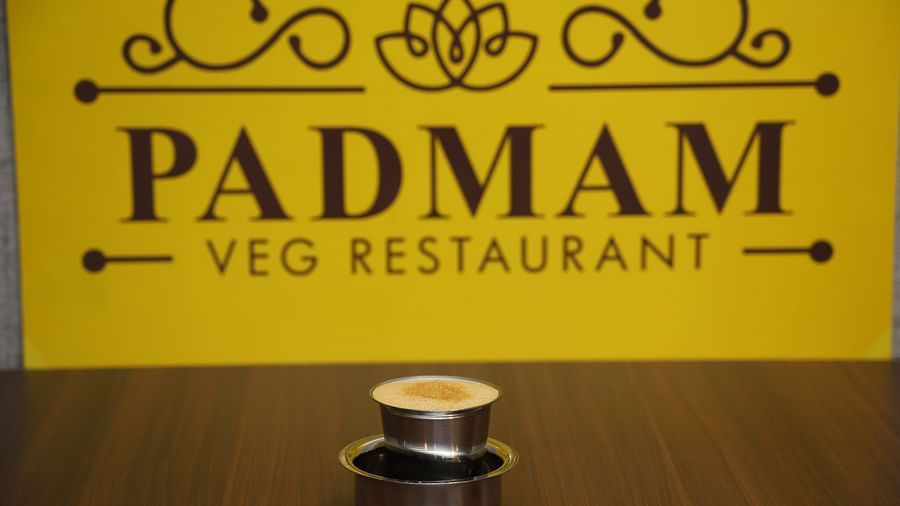 Enjoy a steaming cup of coffee at Padmam Veg Restaurant, the perfect start to your meal.