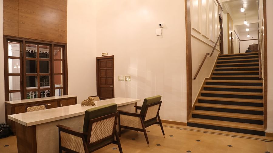 a table and two chairs in the Lobby at Summer House, Nandi Hills