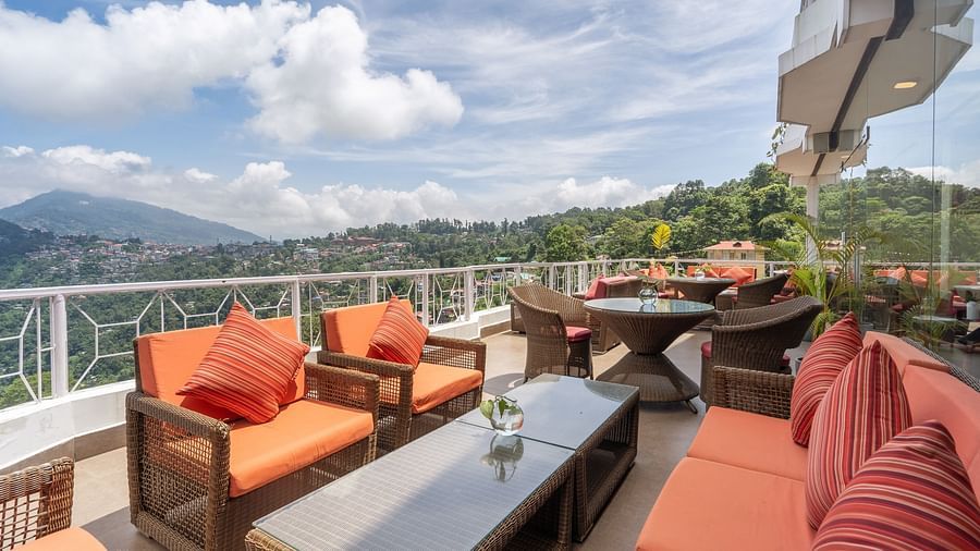 outdoor seating area at the terrace at Summit Lillium Hotel & Spa, Kalimpong