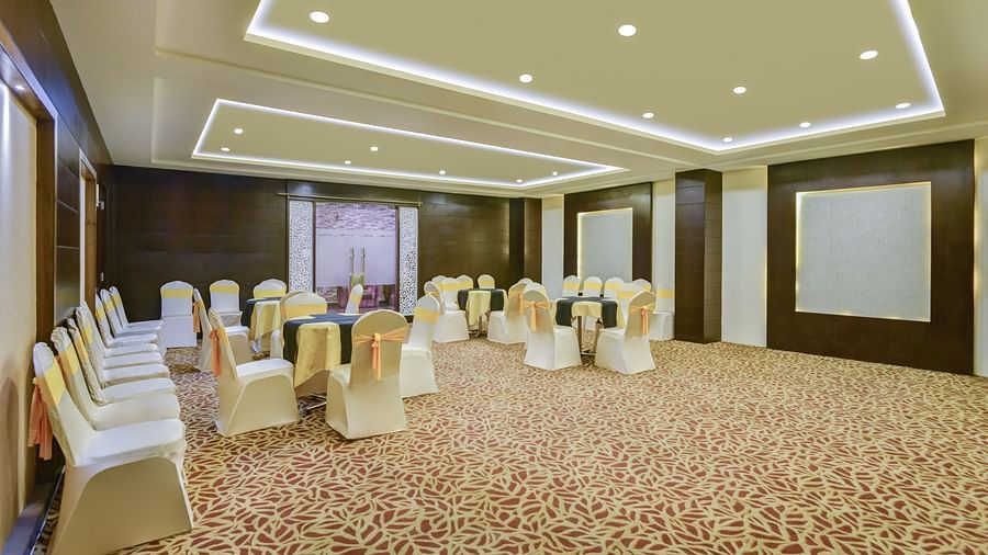 Banquet area with chairs arranged and decorated for the celebration