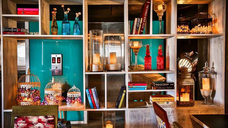 A shelf with various decorative pieces placed on it at T24 Residency, Andheri East, Mumbai