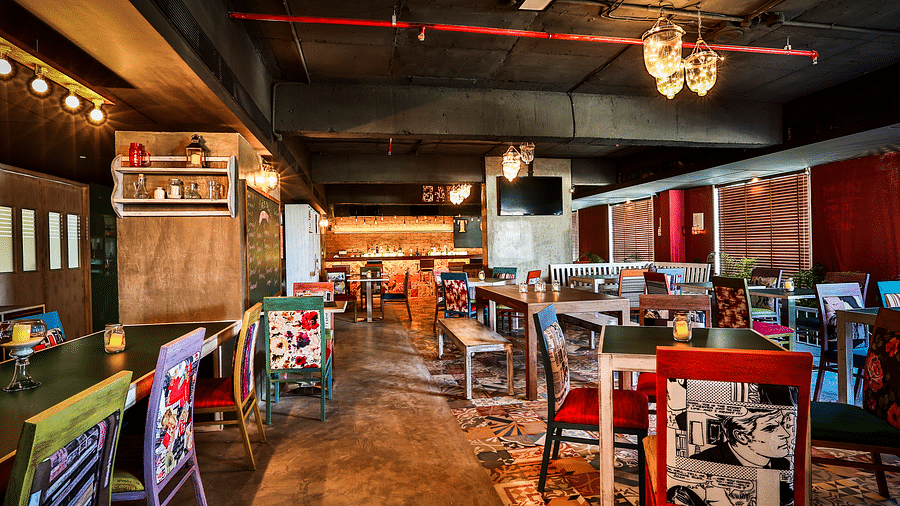 Indoor seating in the restaurant at T24 Residency, Andheri East, Mumbai