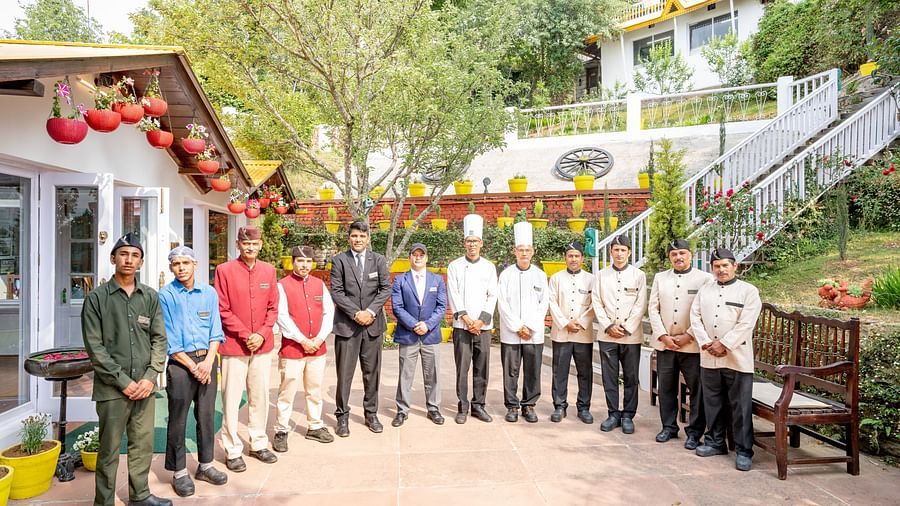 An image of employees of the hotel Te Aroha By Shervani, Mukteshwar
