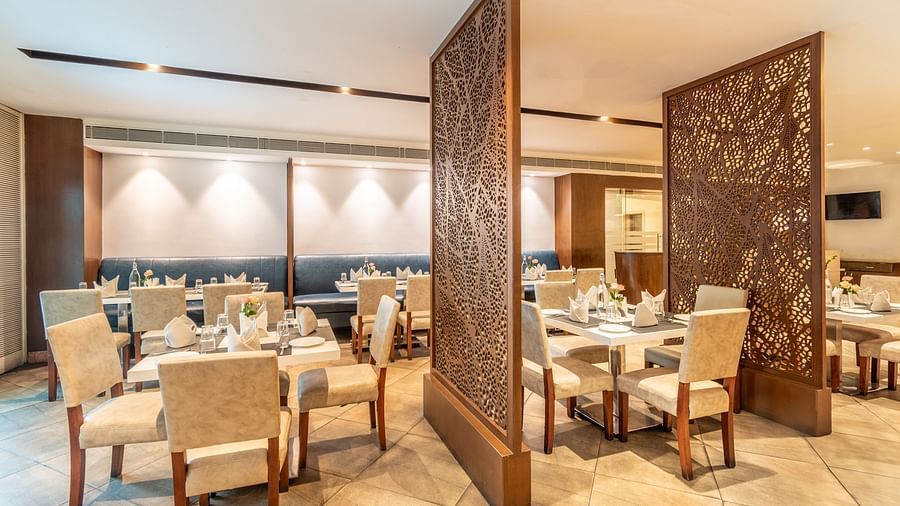 Intimate dining setup with soft lighting and modern aesthetics