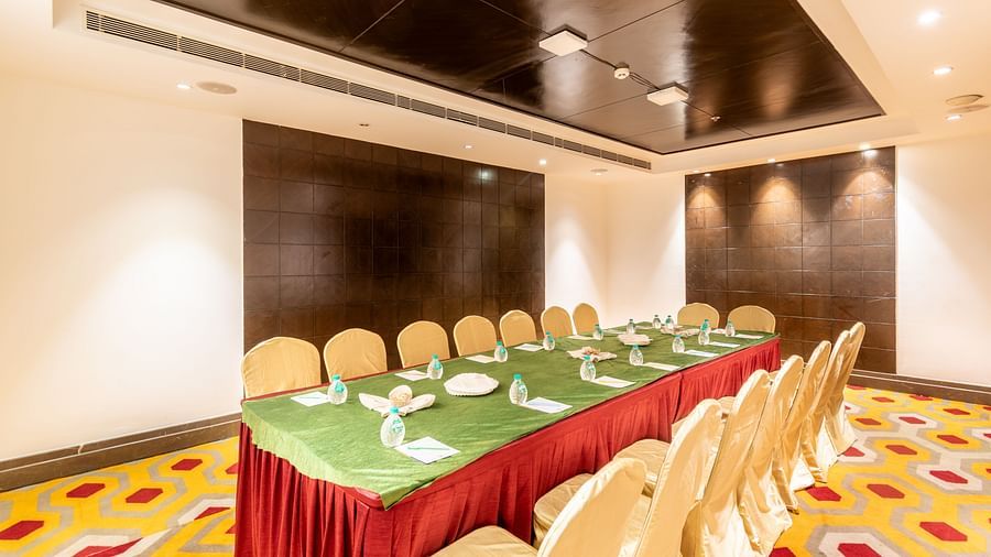 Meeting room featuring a central table layout ideal for executive discussions- TGI Grand Fortuna, Krishnagiri Main Road, Hosur