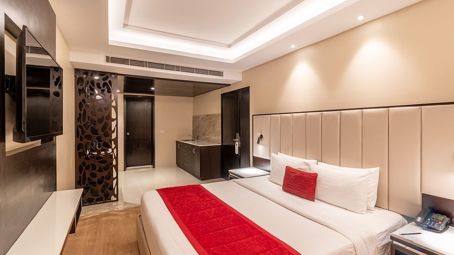 Grand Suite with comfortable bed and warm lighting- TGI Grand Fortuna, Krishnagiri Main Road, Hosur
