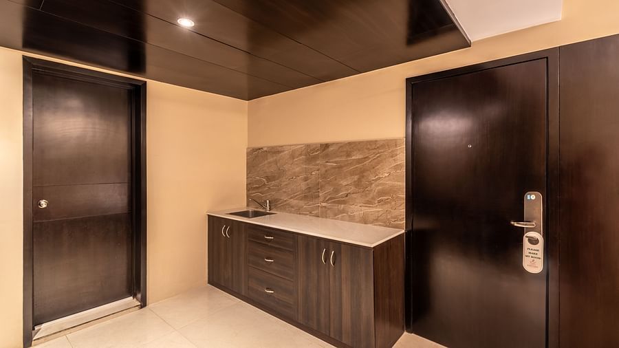 Wood-finished wardrobe area in the Grand Suite- TGI Grand Fortuna, Krishnagiri Main Road, Hosur