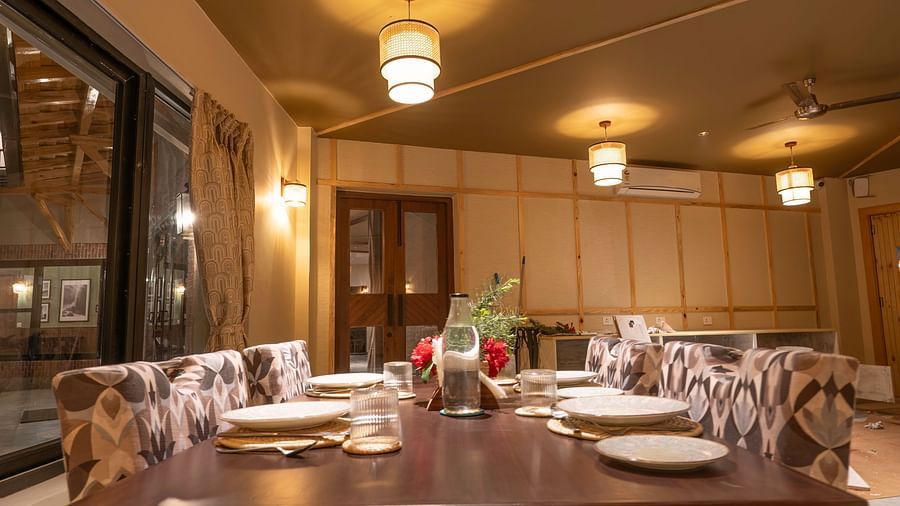 Well-set table in warm lighting at The Chamomile Estate.