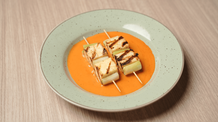 Citrine Hotel | Barbeque placed on a plate filled with sauce.