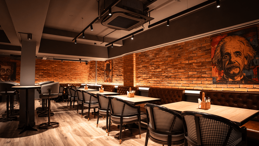 Spacious seating area at Trino Bar featuring modern interiors and cosy lighting