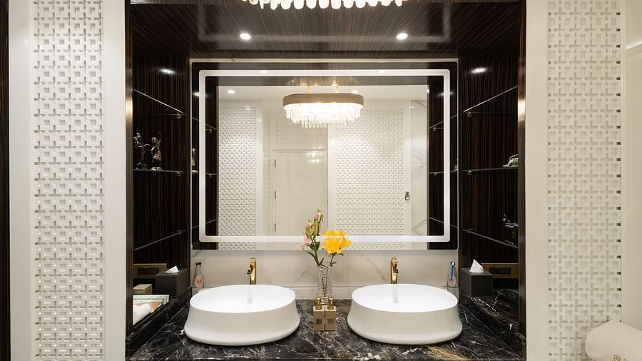 image of our well appointed bathroom with two separate wash basins - The Claridges New Delhi