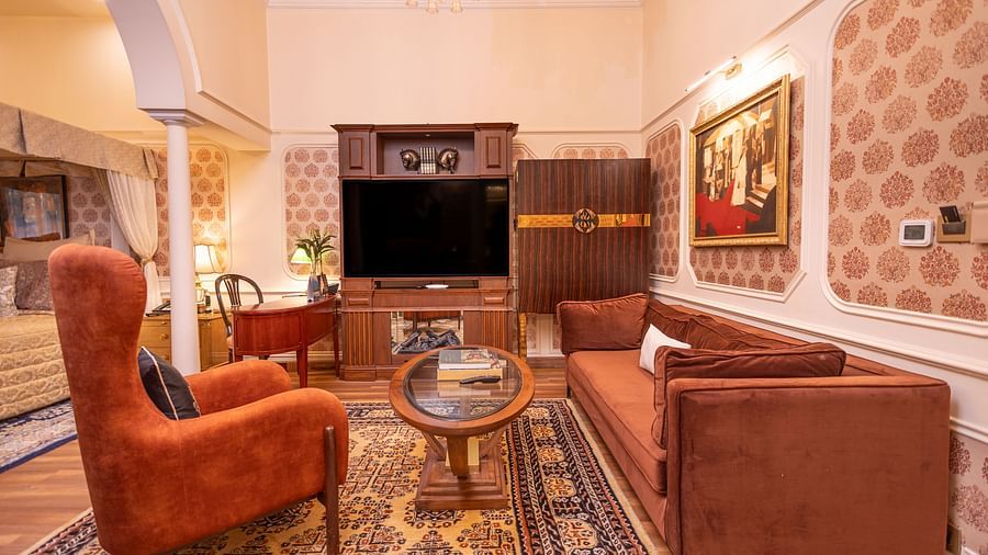image of the family seating area within the bedroom of the heritage parlour suite - The Claridges New Delhi