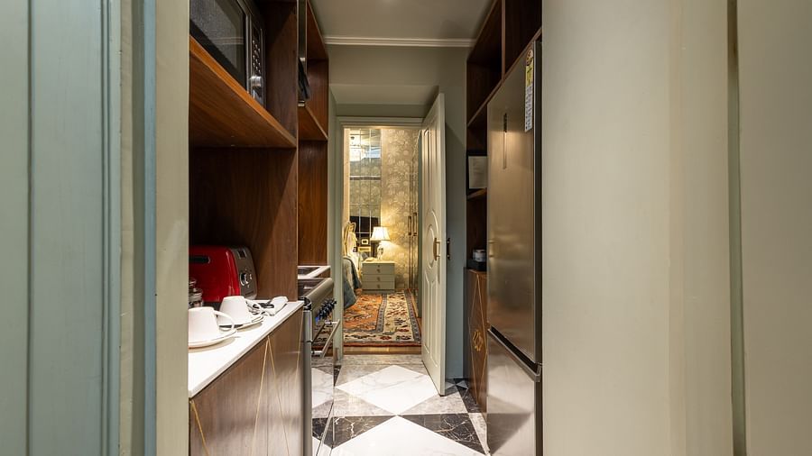 image of a modern compact kitchenette in our heritage luxury suite with modern appliances - The Claridges New Delhi