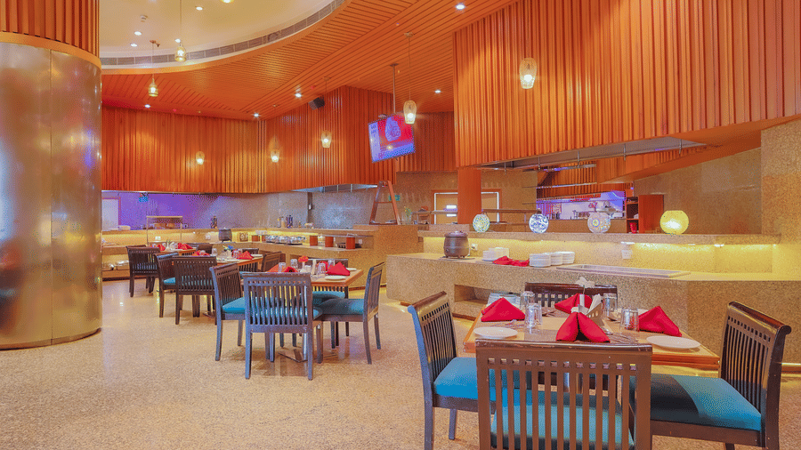 A wide shot of the restaurant's buffet and dining area, ready for guests at The Conway, Meerut.