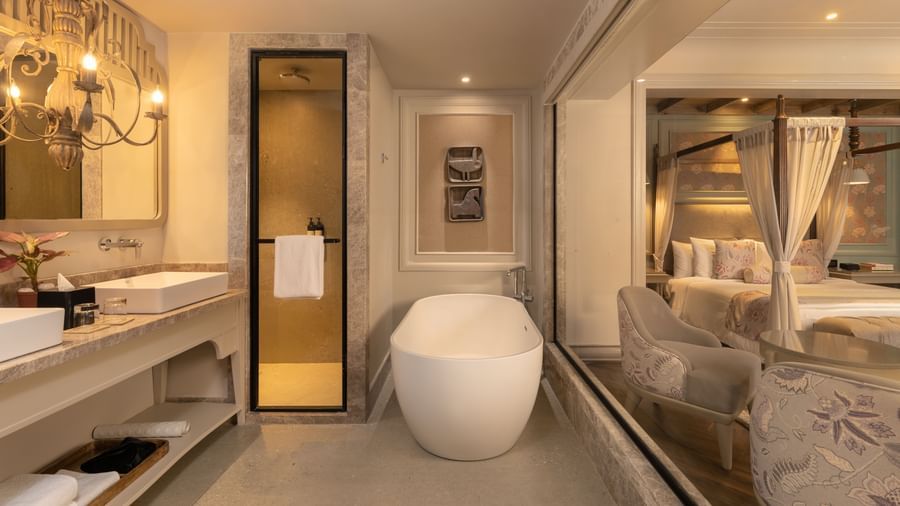 The bathroom featuring a free-standing bathtub along with a shower cubical beside it at the Evren Suite at The Evren, Vagator.