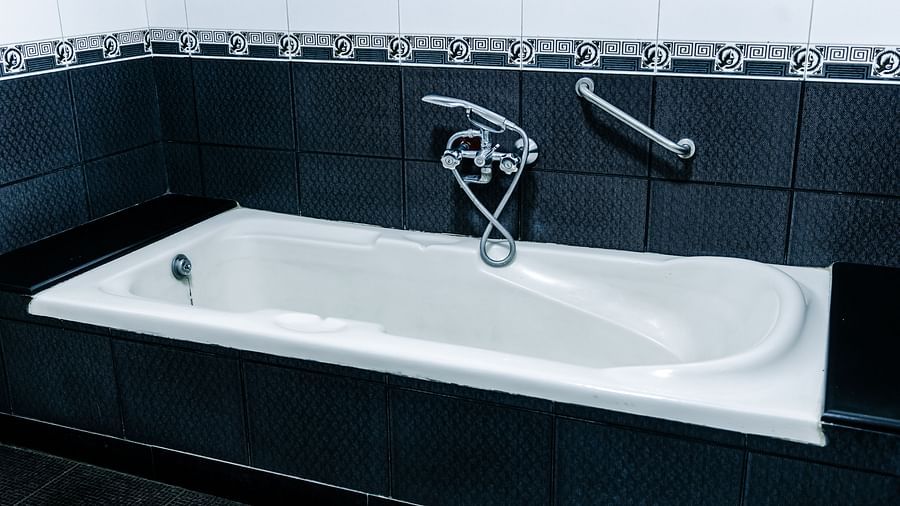image of a full length bathroom at the grand suite bathroom - The Grand Krishna Rooms, Bengaluru