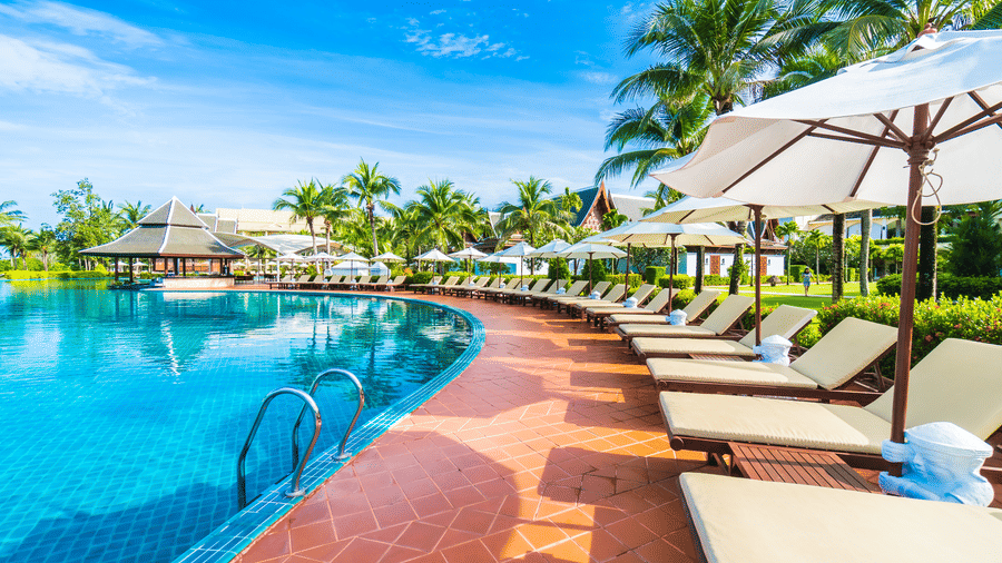 hammocks-umbrella-placed-near-large-pool