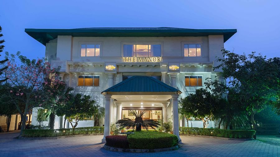 A wide view of the facade of the hotel taken from the front - The Manor, Kashipur