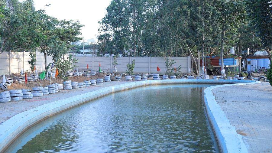A swimming pool area at The Meenakshi Resort by Welcome Inn Hospitality, Bangalore.