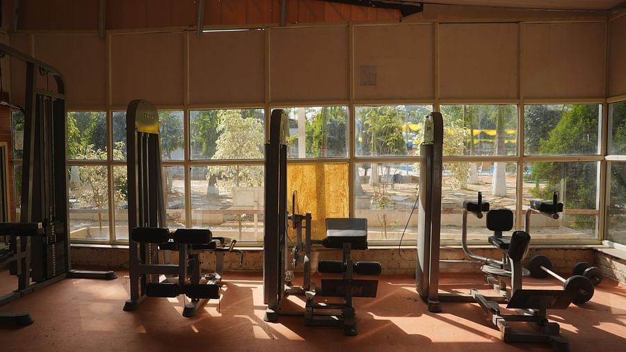 A well-equipped gym at The Meenakshi Resort by Welcome Inn Hospitality, Bangalore.
