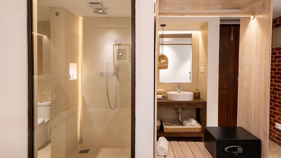 A washroom featuring the shower area and the wash area - The Nanee