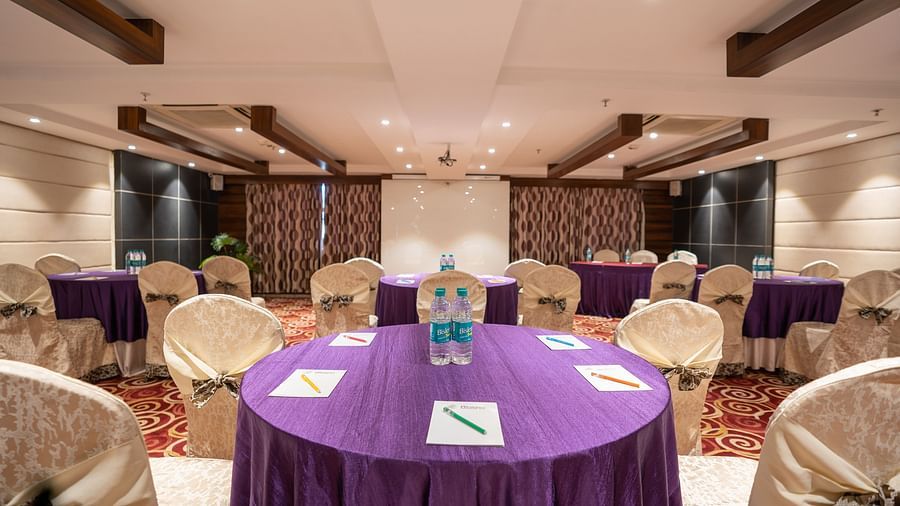 an image of seating arrangement in the Opal hall at The President Hotel, Hubli