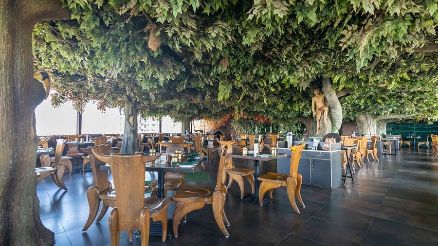 An image of a forest themed Jungle Restaurant at The President Hotel, Hubli