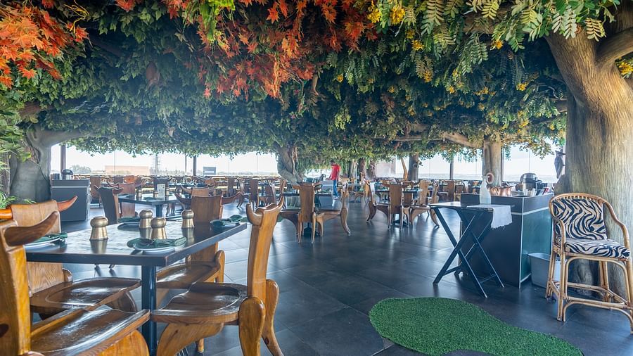 An image of a forest themed Jungle Restaurant at The President Hotel, Hubli