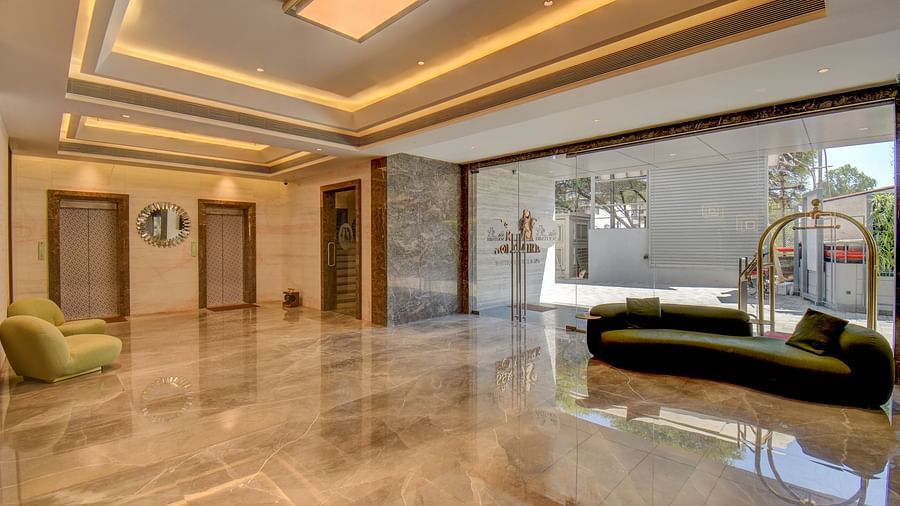 A luxurious lobby at a hotel with ambient lighting and sofa | The SSK Solitaire Boutique Hotel & Spa, Gangapur Road - Nashik