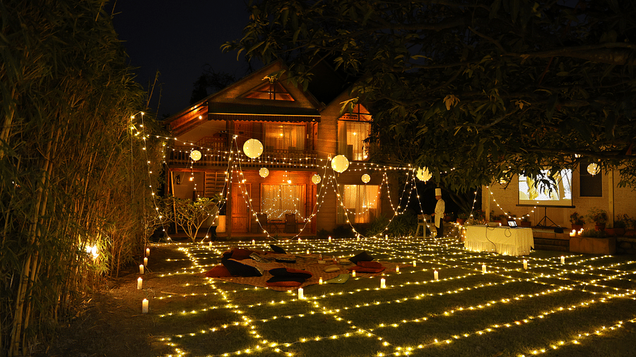A lavish movie night set up at night at The Sylvan Retreat, Dehradun.