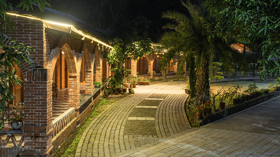 An exterior angle of The Sylvan Retreat, Dehradun at night.