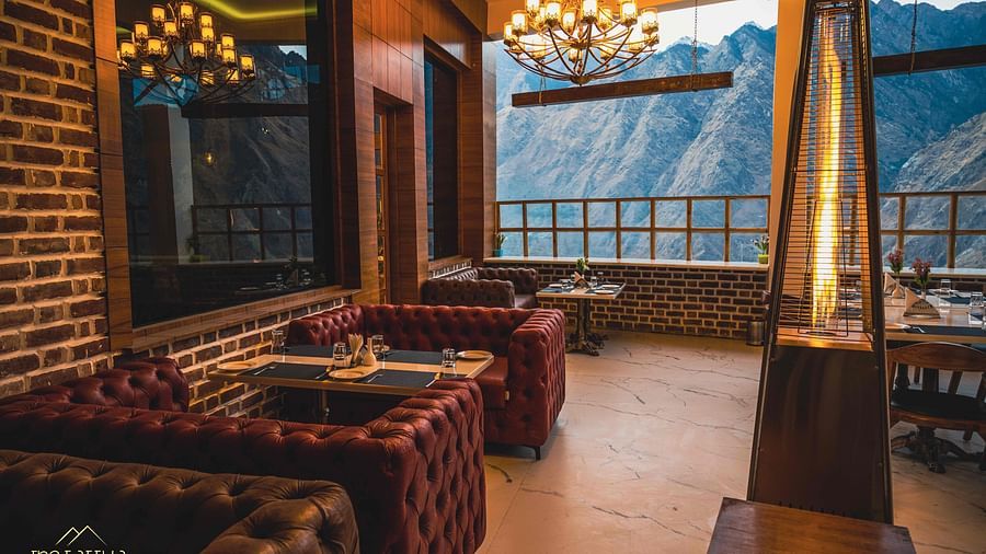 image of the alpenrose restaurant featuring an open mountain views during the day - the tattva boutique resort