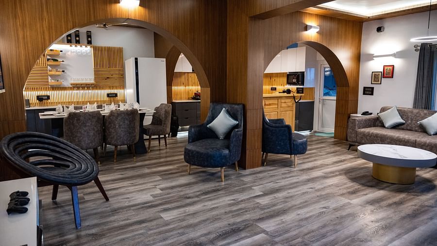 image of the living area with arched doorways in the pent house - The Tattva Boutique Resort