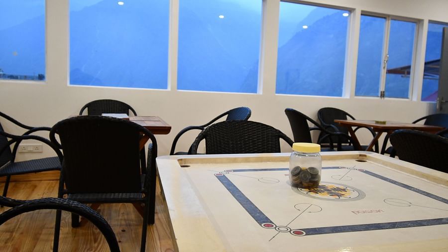 image of the indoor games area featuring a carrom board at the tattva, joshimath