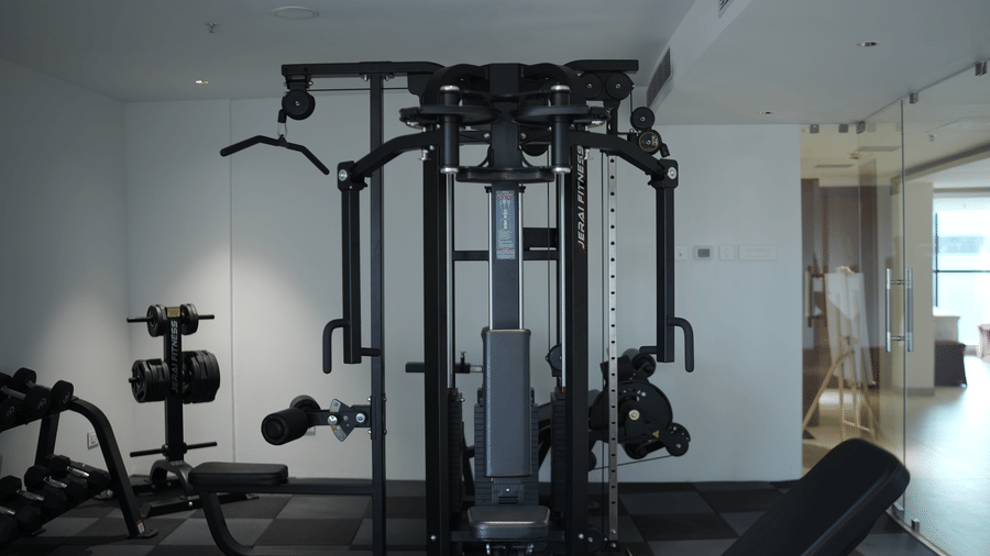 A multi station weight machine stands in the centre of a fitness centre room at Tiara by MPS.