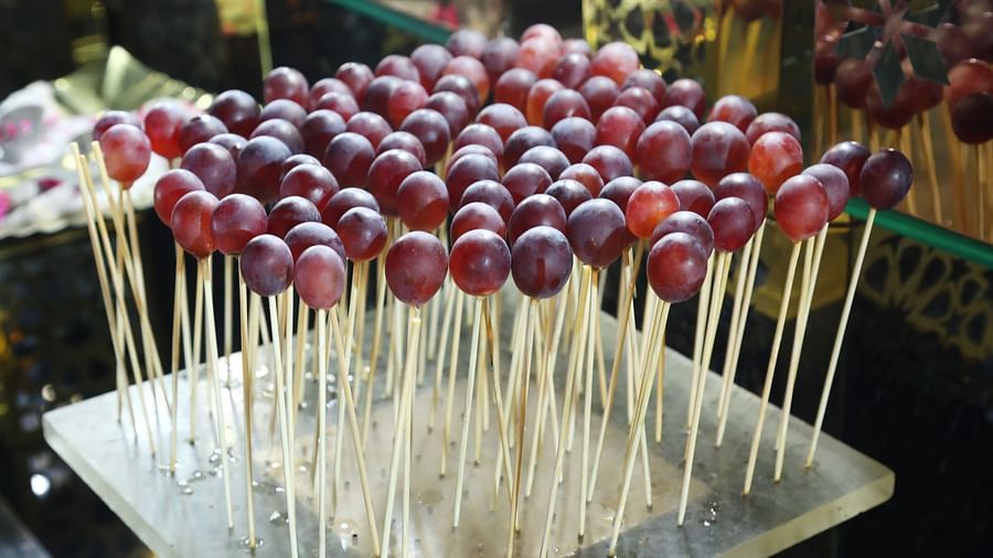 Skewers of red grapes arranged on a tray at Tisya Farms, Gurgaon.