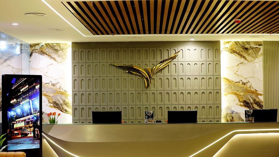 Modern business center at Town Square Suites with artistic wall decor and ample workspace