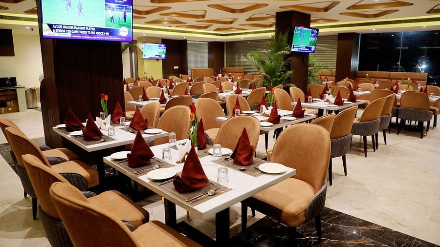 Elegant dining area at Town Square Suites restaurant with stylish seating and fine table settings