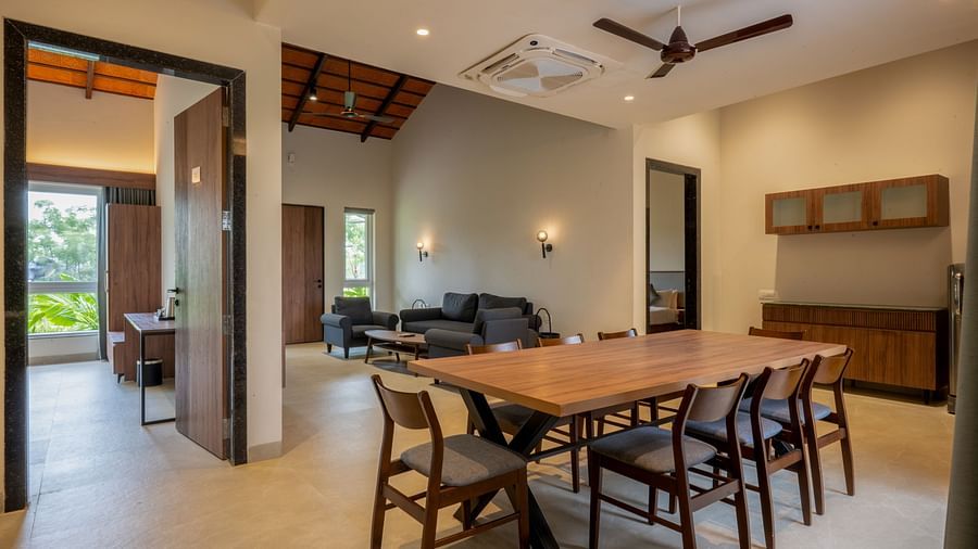 Spacious dining and living area at Ananta Pool Villa – 5-Bedroom Pool Villa, Trance Veechika Resort, Vikarabad, perfect for families.