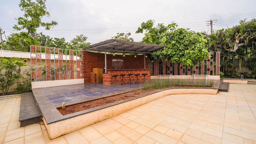 An image of outdoor seating arrangement - Trance Veechika Resort
