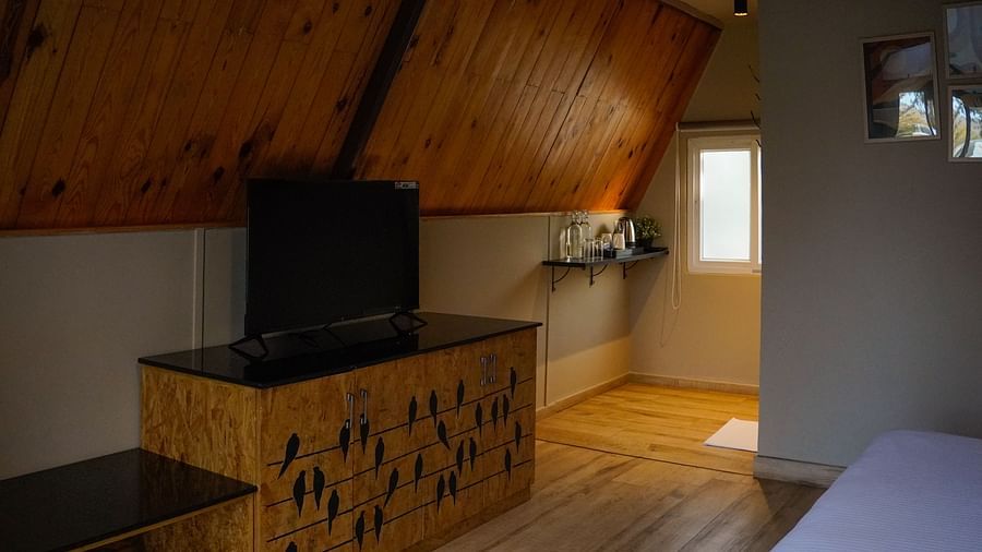 An image of the Aradhya room featuring a flat screen TV - Trance Veechika Resort