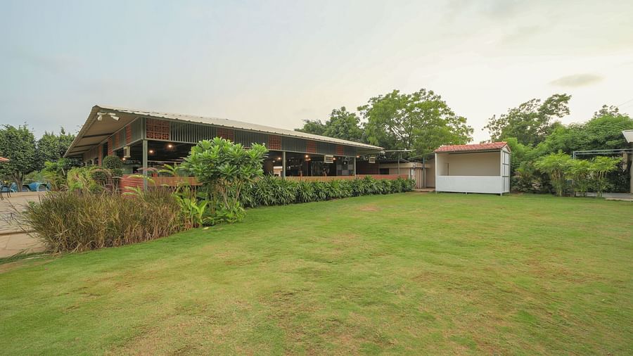 A facade image of a lawn with greenery around - Trance Veechika Resort, Vikarabad