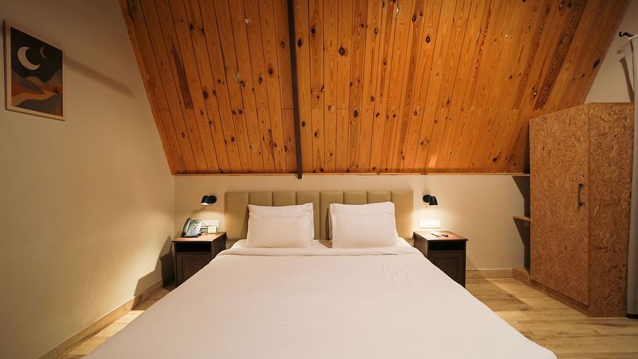 An image of a room with king size bed, bed side tables, cupboard - Trance Veechika Resort, Vikarabad