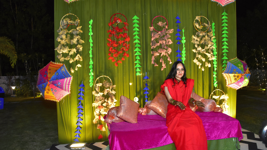 Bride posing amidst a vibrant floral wedding setup at Vedikant Resorts The Mallard Corbett.