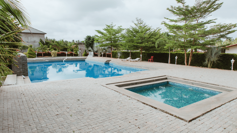 An outdoor swimming pool complex featuring a main swimming pool and a smaller separate jacuzzi plunge pool | Vintage Trails By Ilara