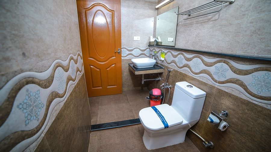 Image of a washroom with a toilet and a sink at WOW Bison Woods.