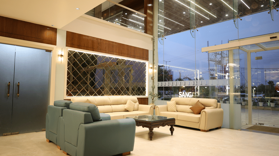 A bright, welcoming lobby area features comfortable sofas near the glass entrance - Lords Inn Sangam, Bhopal