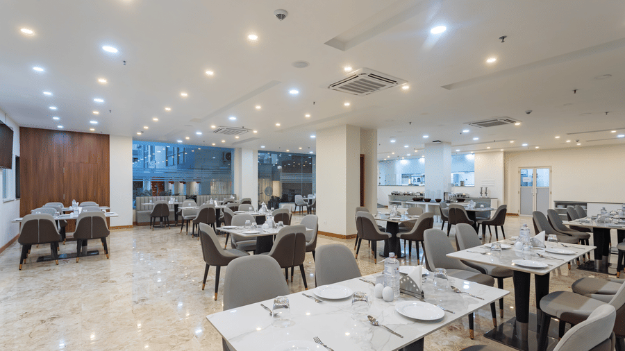 Close up view of dining tables placed spaciously at the Blue Coriander Restaurant at Mandala Norling Lords Prime in Kathmandu.