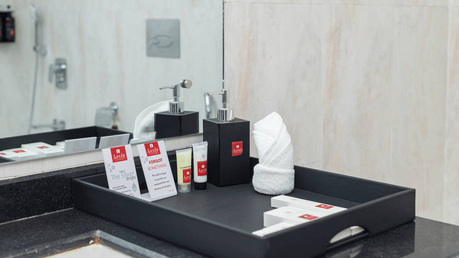 Toiletries near the sink in a bathroom