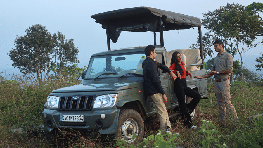 Guests on a jeep safari wildlife tour at Evolve Back Coorg
